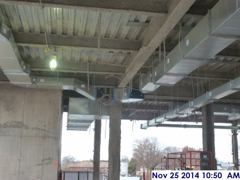 Continued installing ductwork at the 3rd floor Facing North